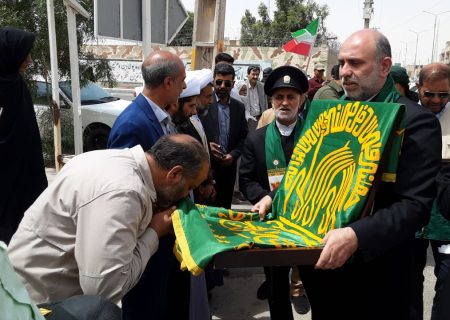 حضور خادمین رضوی وپرچم متبرک حرم امام رضا (علیه السلام) در هیرمند